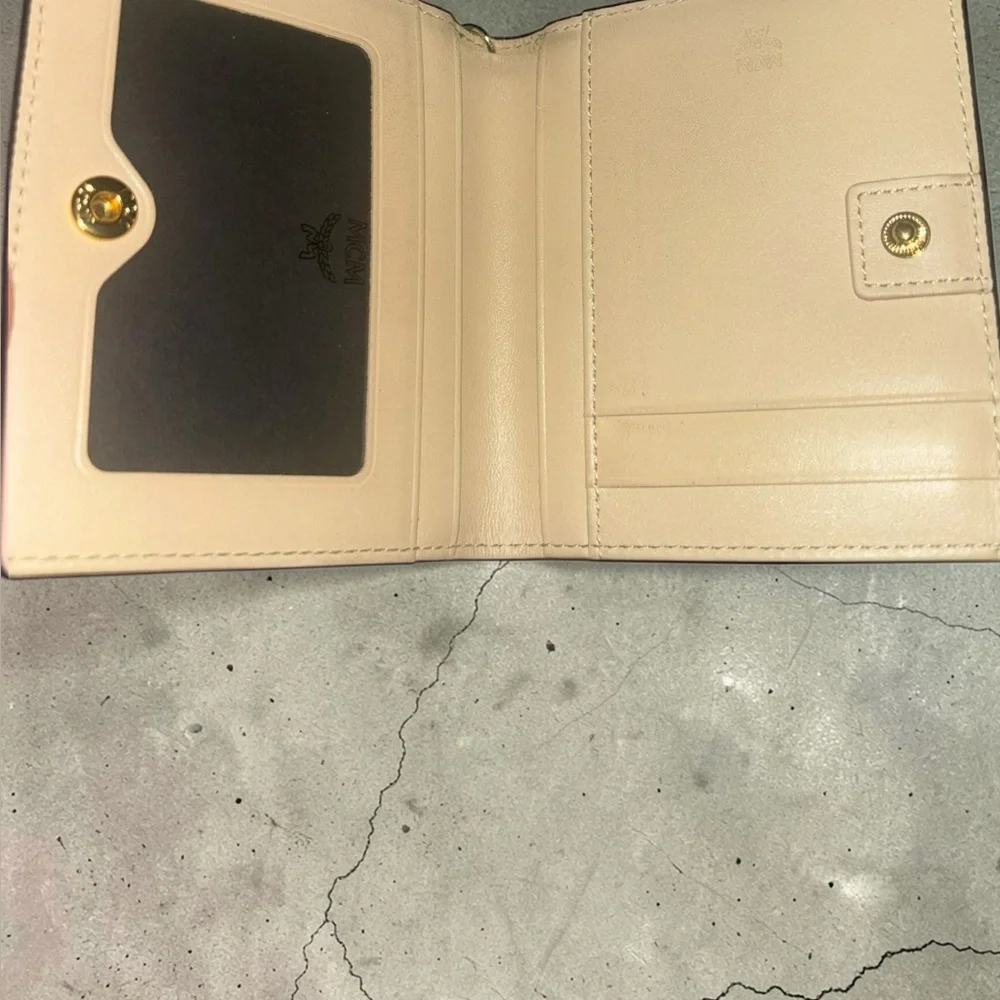 MCM Beige Monogram Tassel Compact Wallet